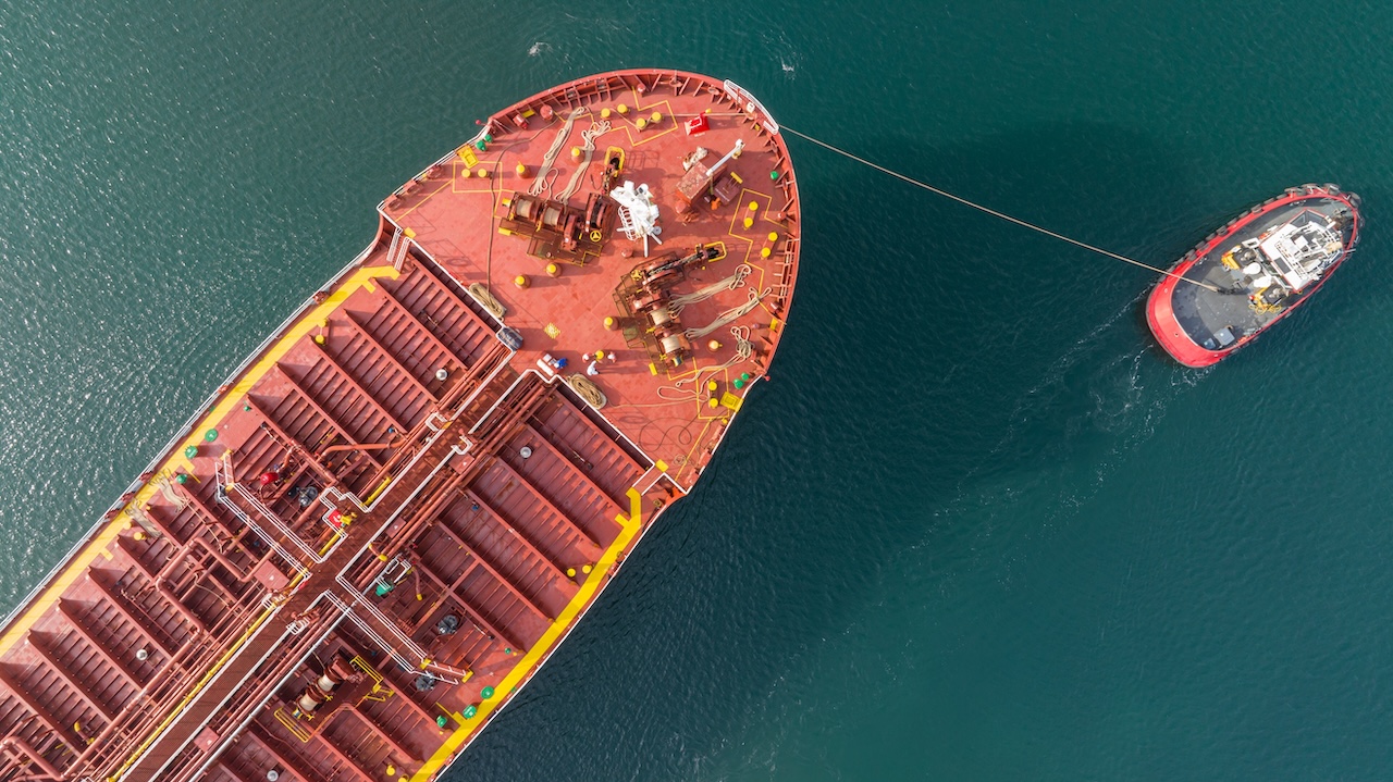 Tanker vessel supporting hydrocarbon operations